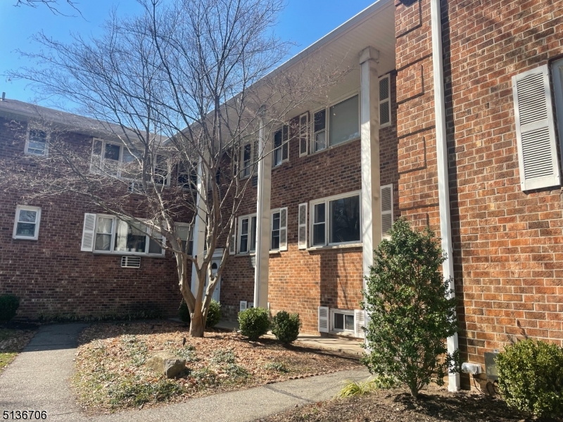 a view of a white building among the street