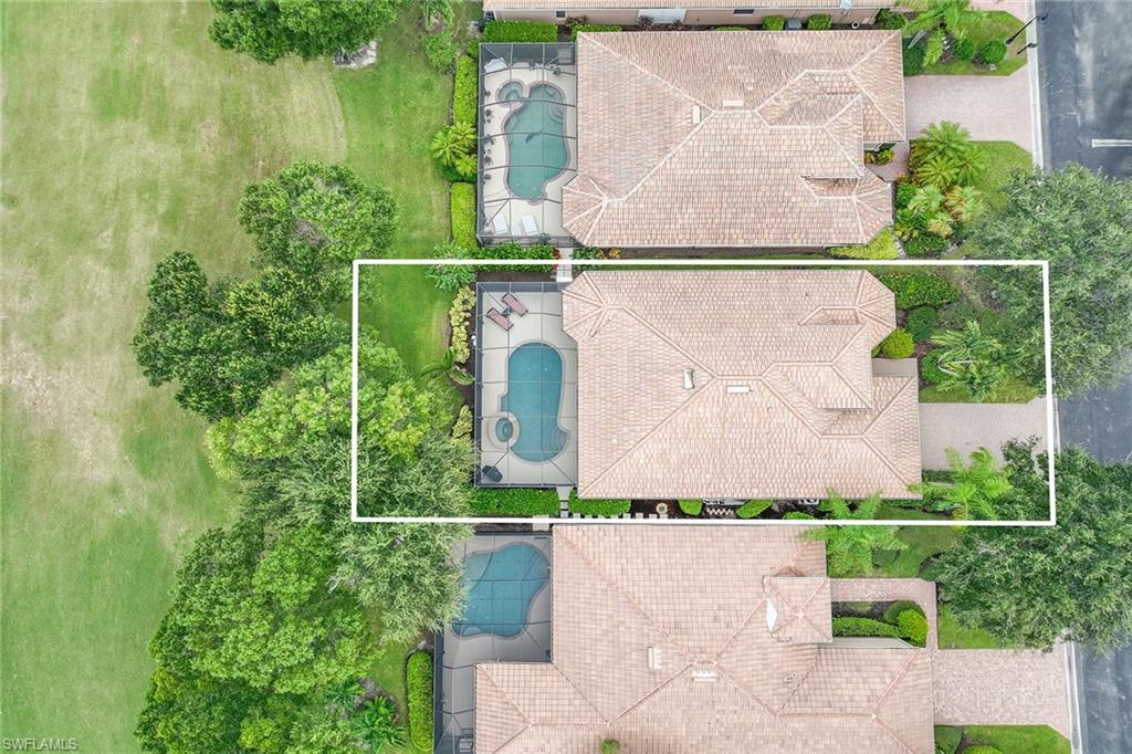 6769 Bent Grass Drive Naples, FL 34113 - Photo 25 of 32 an aerial view of house with yard swimming pool and outdoor seating