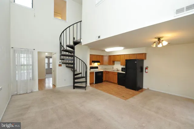a view of a kitchen with a sink