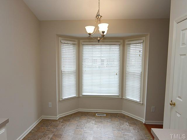 8001 Tobin Place Raleigh, NC 27612 - Photo 3 of 12 Bay window makes this a sunny, bright space!
