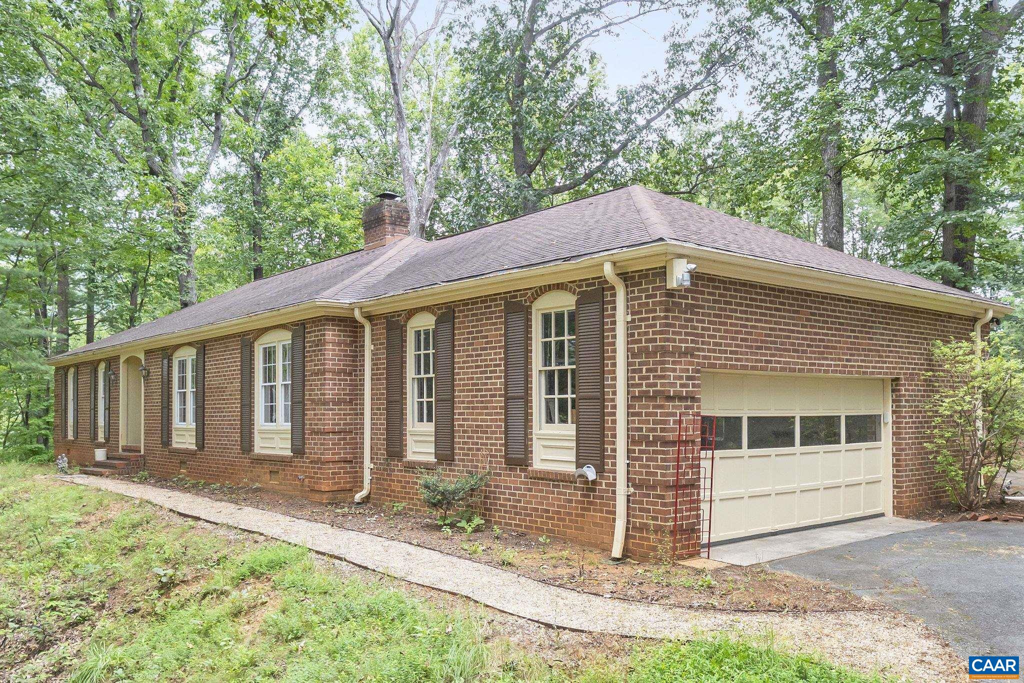 1211 Lanetown Road Crozet, VA 22932 - Photo 1 of 50 a front view of a house with a yard