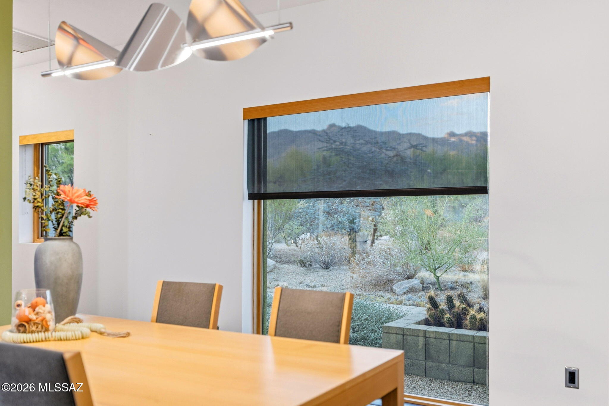 5070 North Valley View Road Tucson, AZ 85718 - Photo 18 of 51 a view of a dining room with a table and chairs