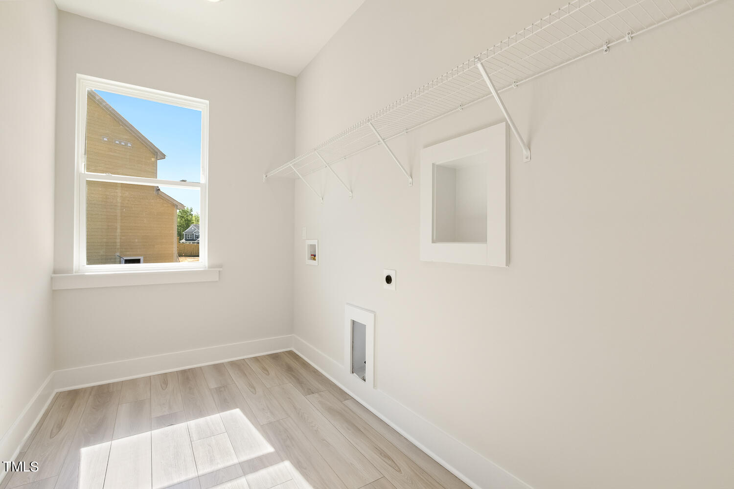 1609 Golden Sundew Drive Willow Spring, NC 27592 - Photo 4 of 54 Laundry Room off the Foyer