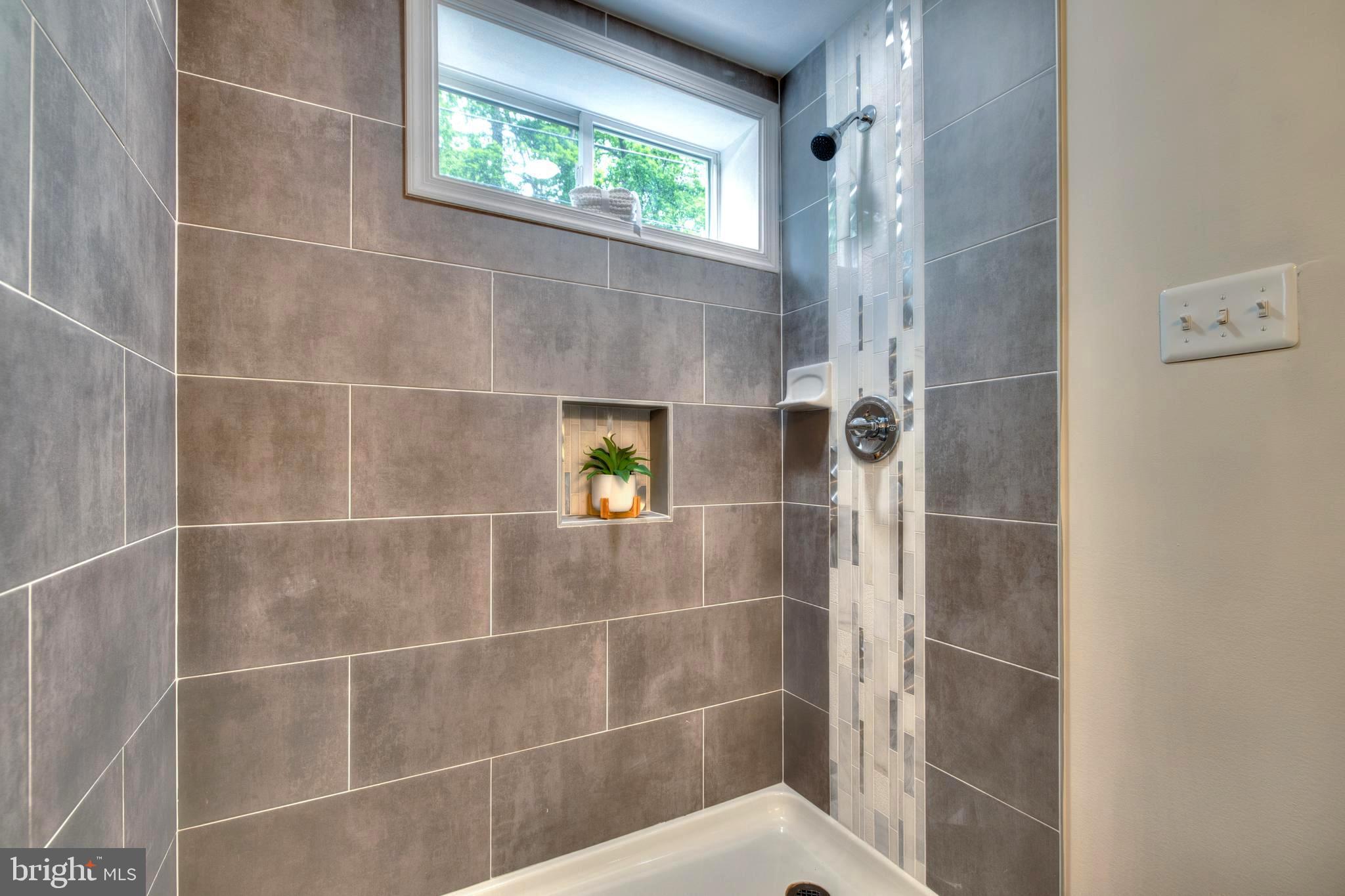 8710 Reading Road Silver Spring, MD 20901 - Photo 32 of 37 BEAUTIFUL OVERSIZED CERAMIC TILE
