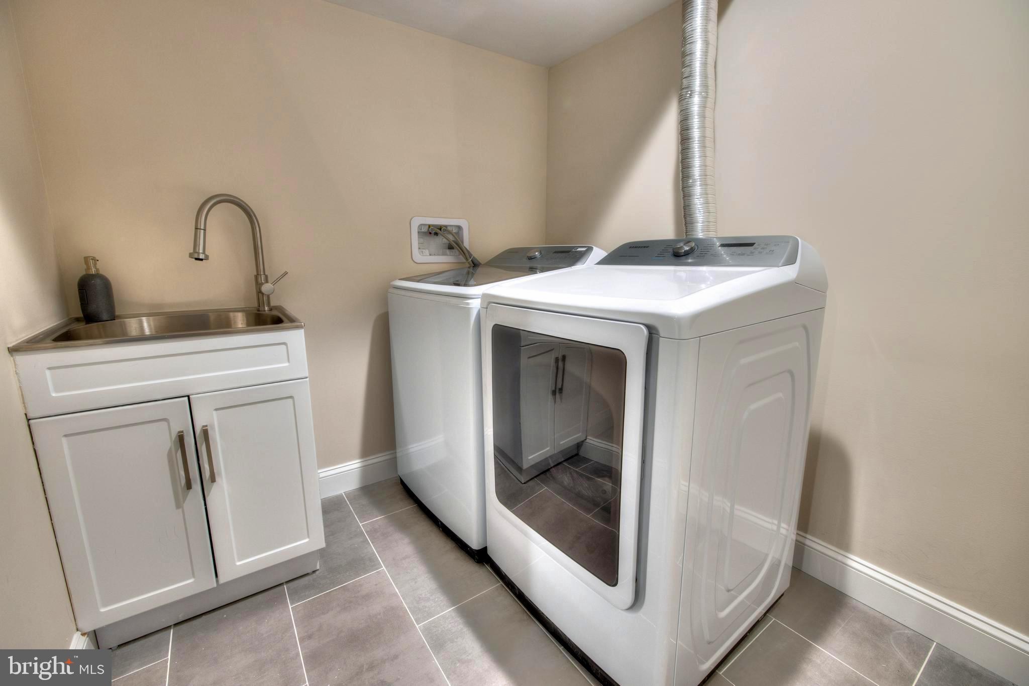 8710 Reading Road Silver Spring, MD 20901 - Photo 34 of 37 WALK-IN LAUNDRY W/SINK & NEW WASHER & DRYER