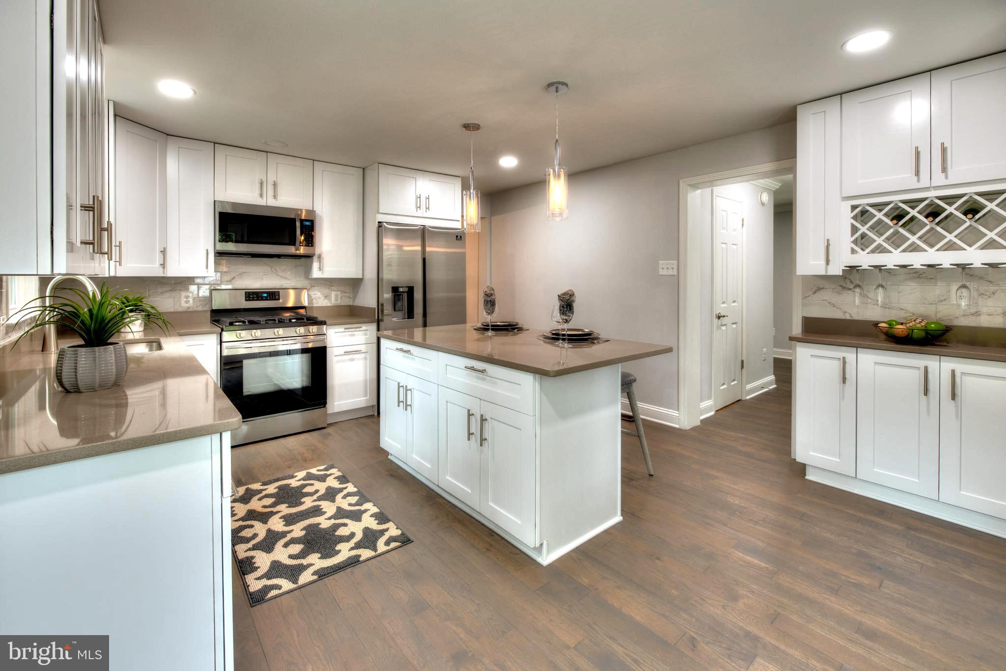 8710 Reading Road Silver Spring, MD 20901 - Photo 10 of 37 GOURMET KITCHEN W/HARDWOOD FLOORING, SS APPLIANCES
