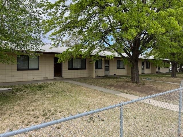 257 29 Road Grand Junction, CO 81503 - Photo 1 of 8 a house with trees in front of it