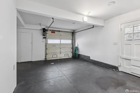 a view of an empty room and storage
