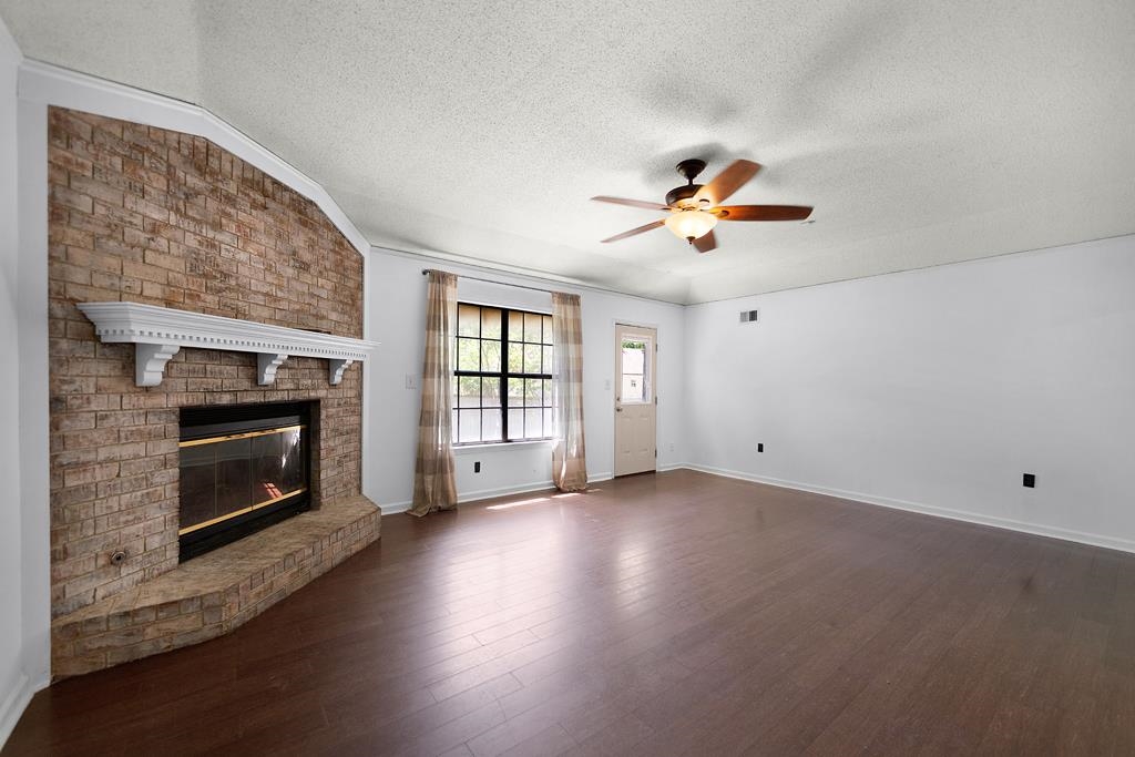 395 Park Hill Road Collierville, TN 38017 - Photo 7 of 22 The gas fireplace is sure to keep you warm on those chilly nights.