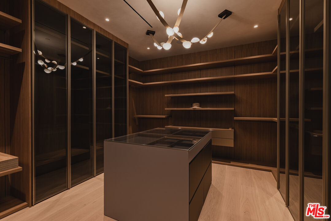 17177 Adlon Road Encino, CA 91436 - Photo 11 of 21 a storage room with washer and dryer