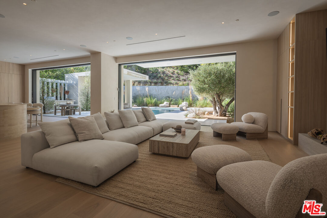 17177 Adlon Road Encino, CA 91436 - Photo 6 of 21 a living room with furniture and a large window