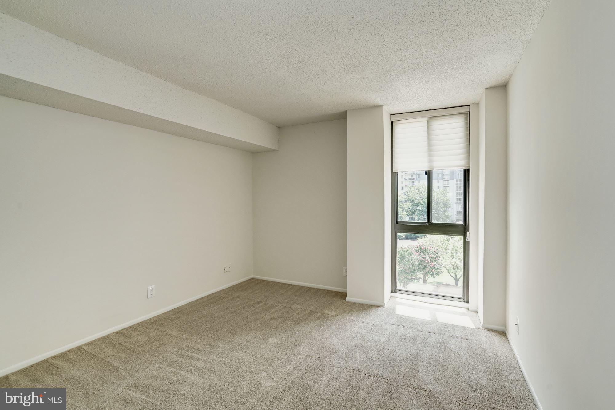 6800 Fleetwood Road, Unit 610 McLean, VA 22101 - Photo 16 of 26 a view of an empty room and window
