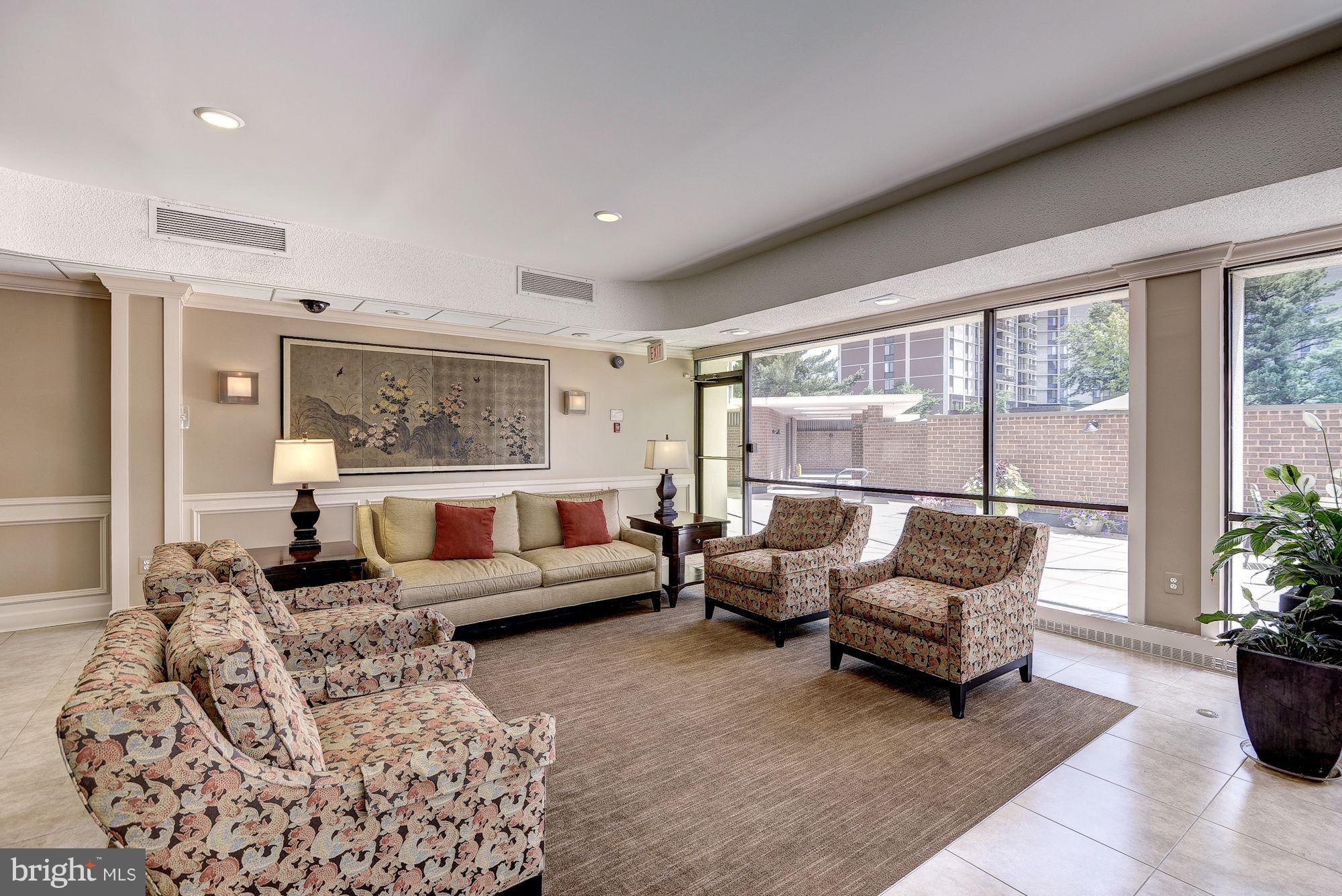 6800 Fleetwood Road, Unit 610 McLean, VA 22101 - Photo 25 of 26 a living room with furniture and a large window