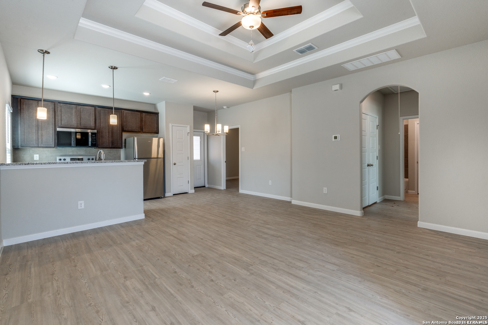 402 Trefger Street Seguin, TX 78155 - Photo 3 of 10 a view of a livingroom with a kitchen