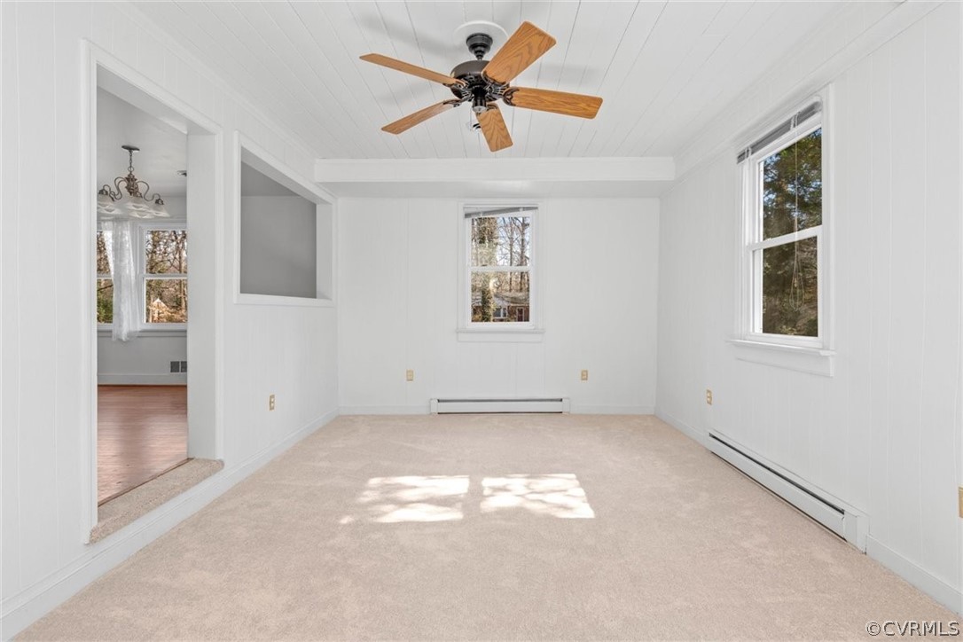 3928 Hickory Road Richmond, VA 23235 - Photo 25 of 49 Spacious Family Room looking into Dining Room are with brand new carpet & fresh paint