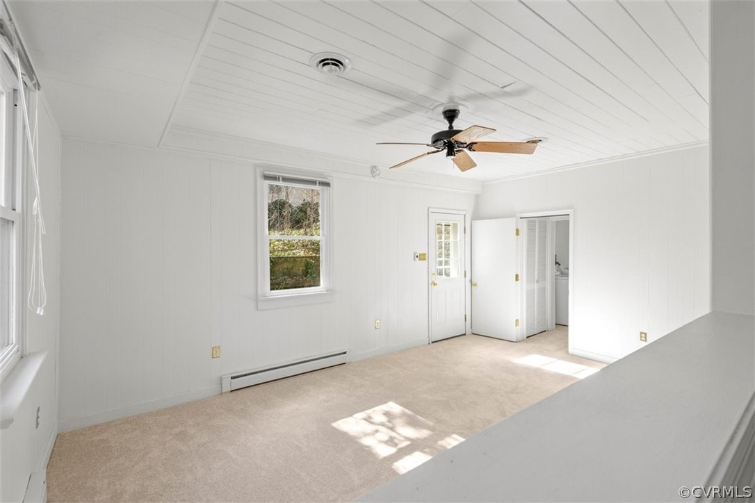 3928 Hickory Road Richmond, VA 23235 - Photo 26 of 49 Spacious Family Room looking into Dining Room are with brand new carpet & fresh paint