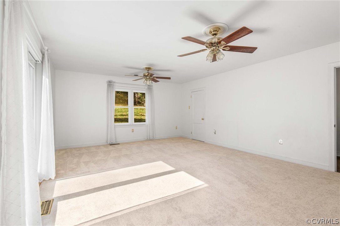 3928 Hickory Road Richmond, VA 23235 - Photo 29 of 49 Spacious Family Room looking into Dining Room are with brand new carpet & fresh paint