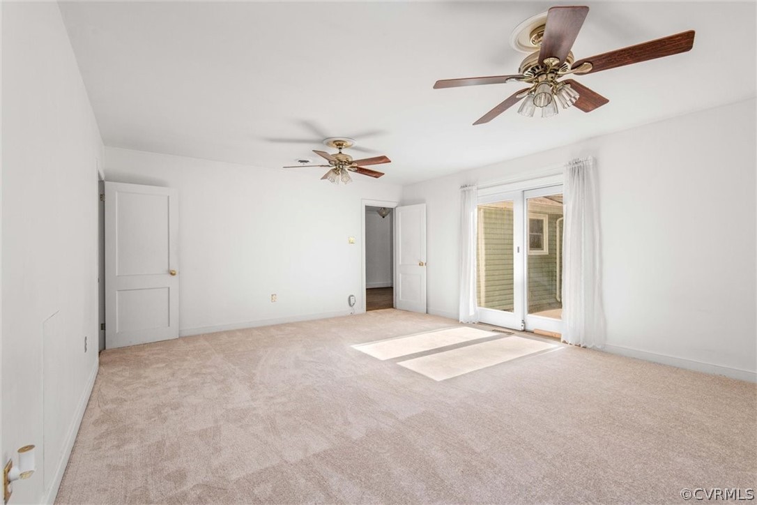 3928 Hickory Road Richmond, VA 23235 - Photo 30 of 49 Spacious Family Room looking into Dining Room are with brand new carpet & fresh paint