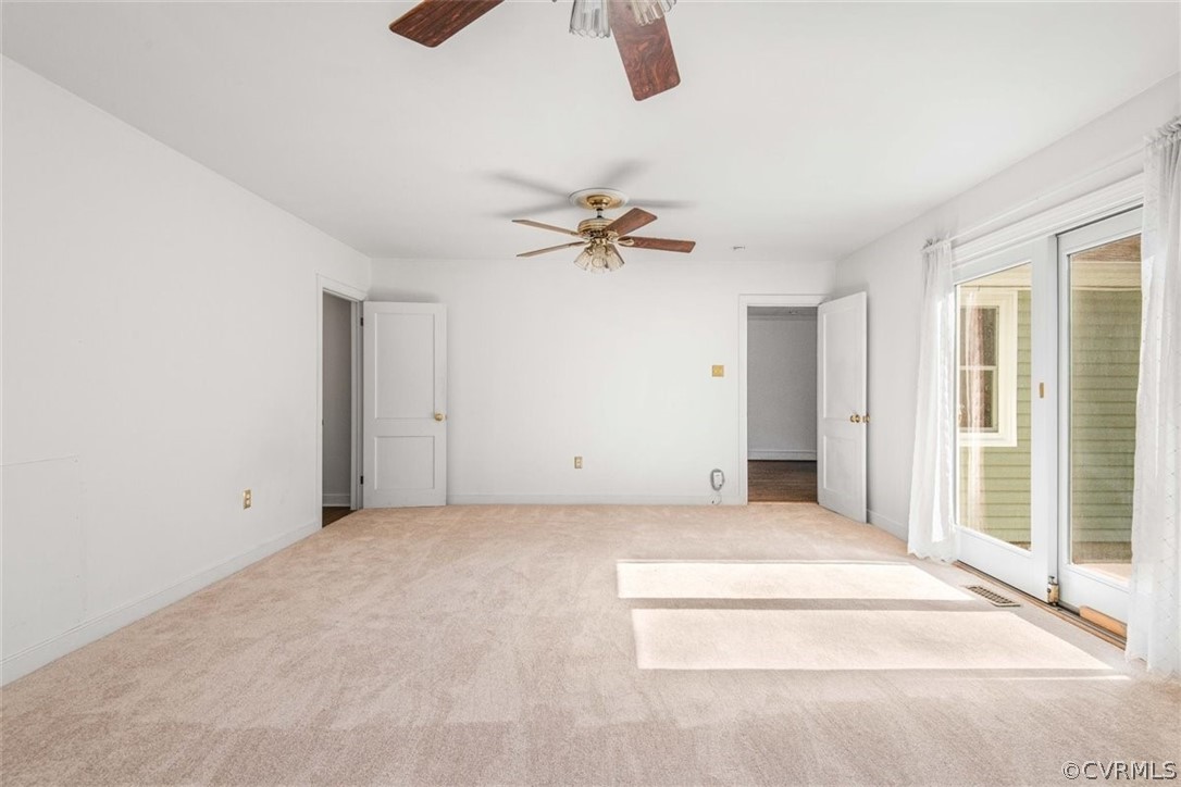 3928 Hickory Road Richmond, VA 23235 - Photo 31 of 49 Spacious Family Room looking into Dining Room are with brand new carpet & fresh paint