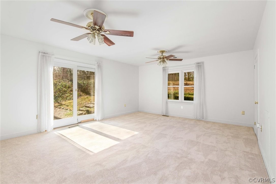 3928 Hickory Road Richmond, VA 23235 - Photo 32 of 49 Spacious Family Room looking into Dining Room are with brand new carpet & fresh paint