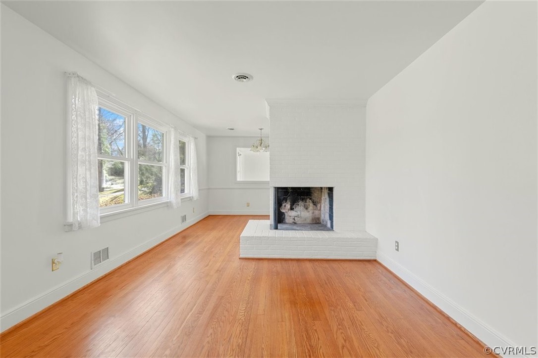 3928 Hickory Road Richmond, VA 23235 - Photo 9 of 49 Expansive Great Room with brick wood burning fireplace