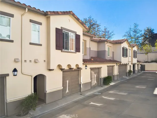 a view of a street with a houses