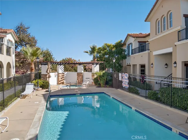 a view of a chairs and table in a patio