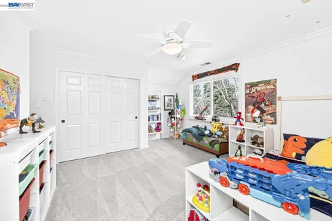 a view of play room with toys and toys