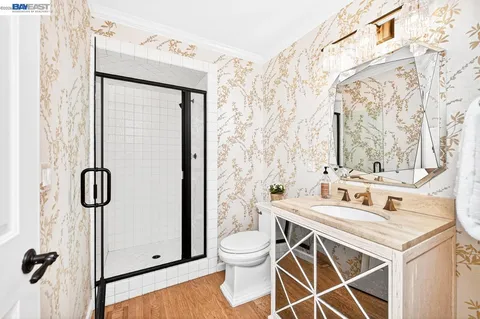 a bathroom with a sink and a large window