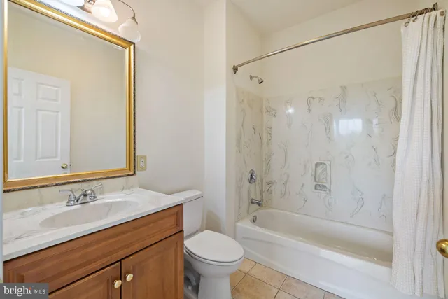 a swimming pool with outdoor seating and yard