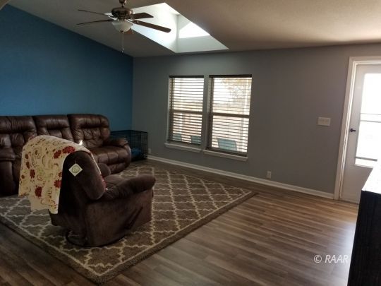 1165 Cory Street Ridgecrest, CA 93555 - Photo 3 of 26 a living room with furniture and a window
