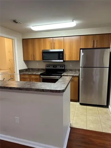 $1,900 | 5840 West Sample Road, Unit 306, Coral Springs, FL 33067