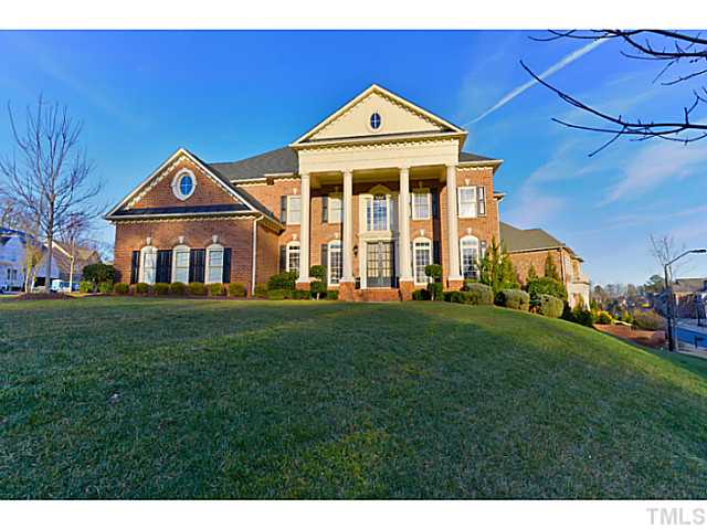 11806 Lowery Ridge Drive Raleigh, NC 27614 - Photo 24 of 25 a front view of a house with a yard