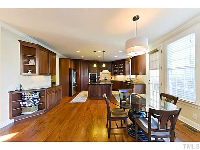 11806 Lowery Ridge Drive Raleigh, NC 27614 - Photo 4 of 25 a dining room with furniture and window