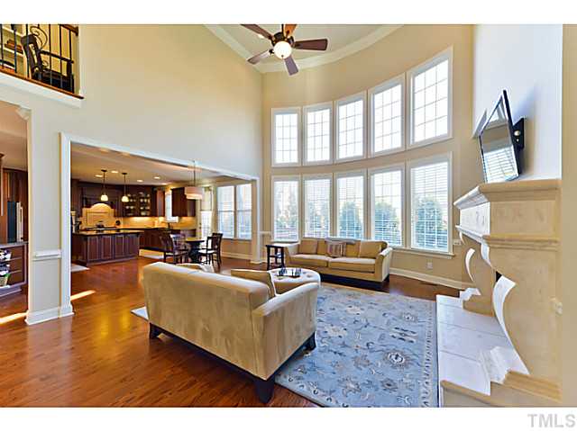 11806 Lowery Ridge Drive Raleigh, NC 27614 - Photo 7 of 25 a living room with furniture and a large window