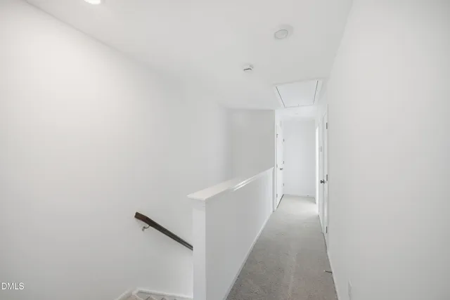 a picture of a park with of a white building