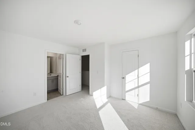 a bathroom with a sink toilet and mirror