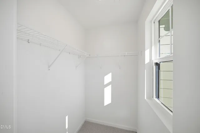 a bathroom with a sink toilet and mirror