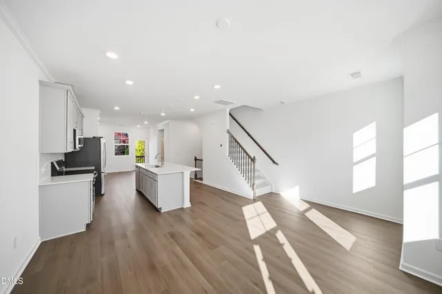 a bathroom with a double vanity sink and mirror