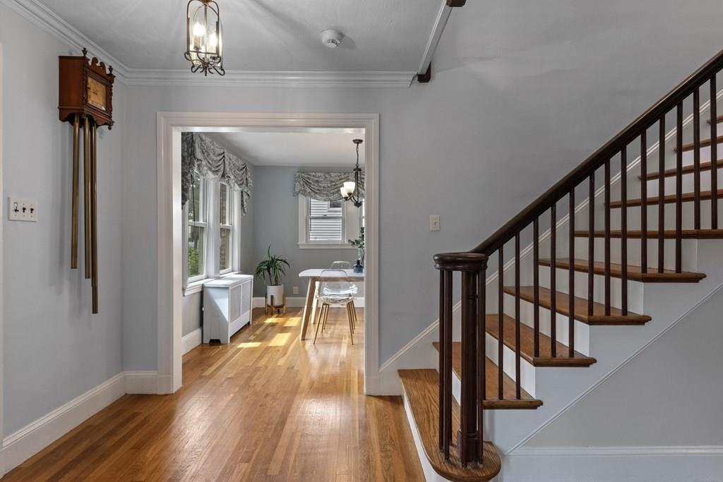 17 Lodge Road Newton, MA 02465 - Photo 3 of 31 a view of entryway and hall with wooden floor