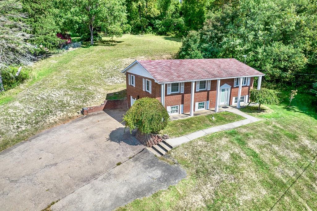 503 Virginia Drive Rostraver Township, PA 15012 - Photo 29 of 37 a view of a house with a yard