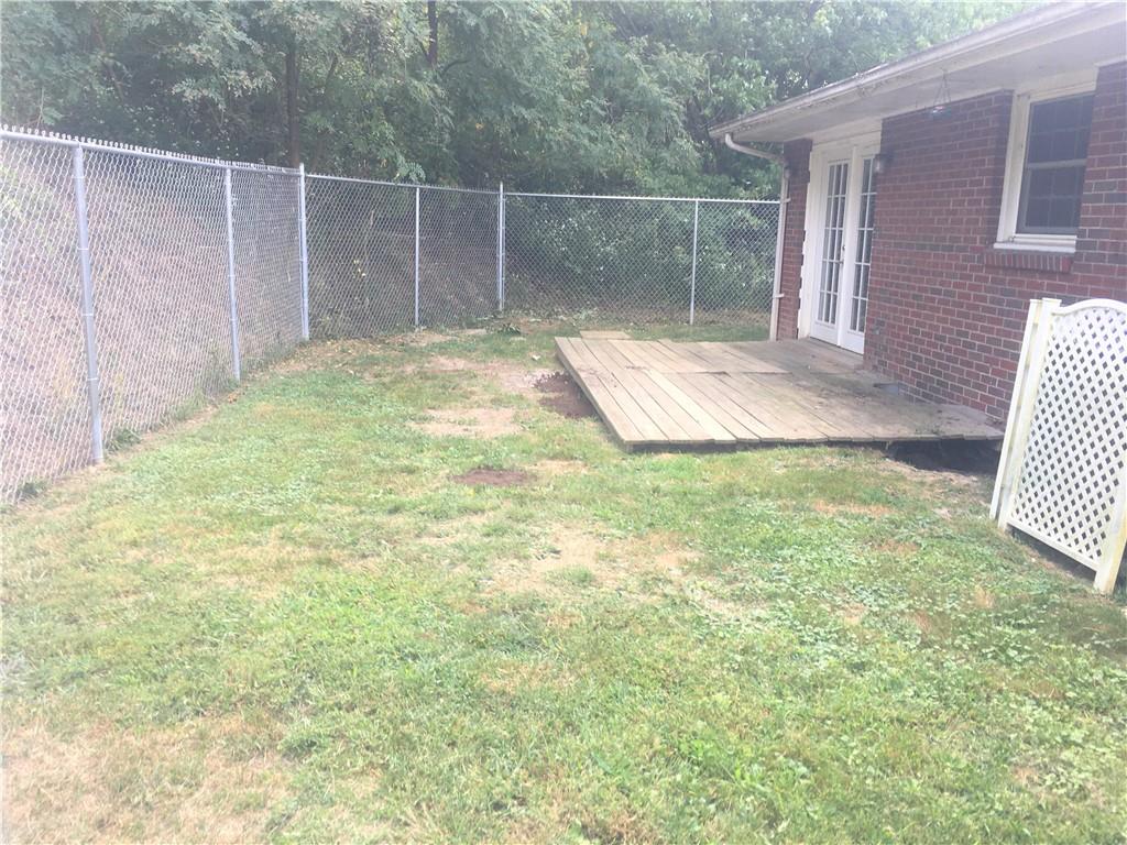 503 Virginia Drive Rostraver Township, PA 15012 - Photo 32 of 37 a backyard of a house with table and chairs