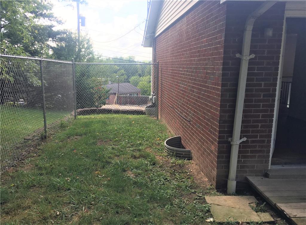 503 Virginia Drive Rostraver Township, PA 15012 - Photo 33 of 37 a view of a backyard with green space