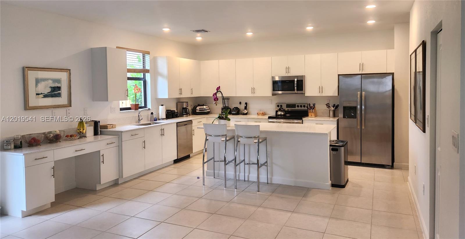 24400 Southwest 119th Place Homestead, FL 33032 - Photo 4 of 22 a kitchen with appliances cabinets and a sink