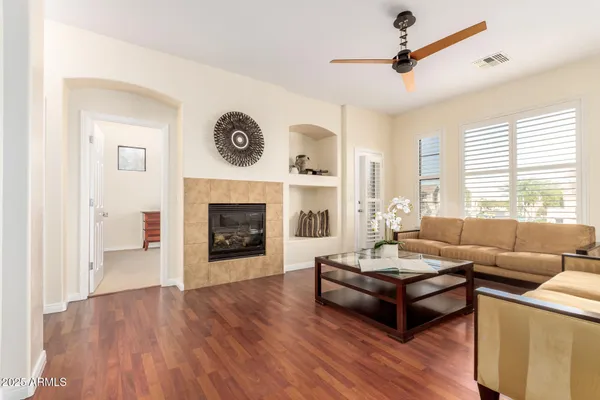 a view of kitchen with furniture and wooden floor