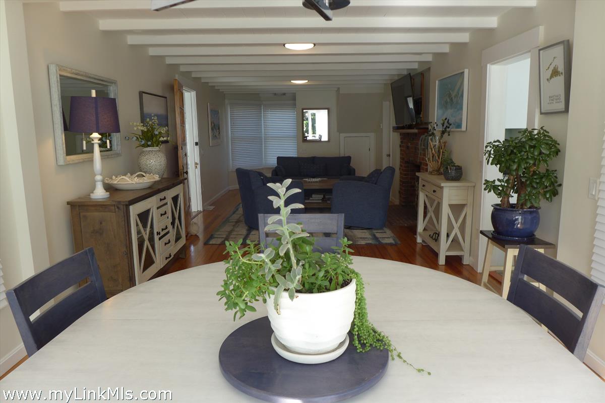 34 Windemere Road Oak Bluffs, MA 02557 - Photo 13 of 44 a view of a dining room with furniture and a potted plant
