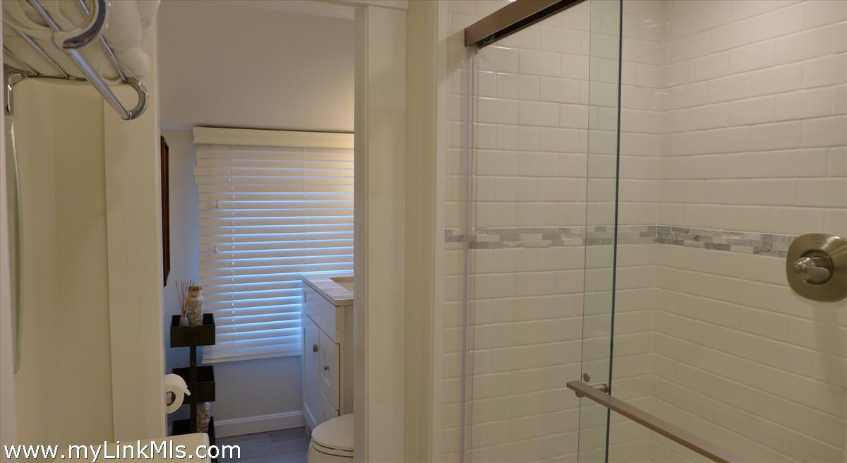 34 Windemere Road Oak Bluffs, MA 02557 - Photo 29 of 44 a bathroom with a shower