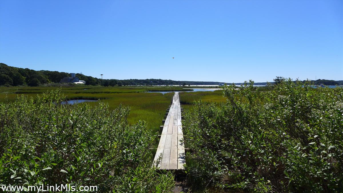 34 Windemere Road Oak Bluffs, MA 02557 - Photo 40 of 44 a view of a lake with a mountain in the background