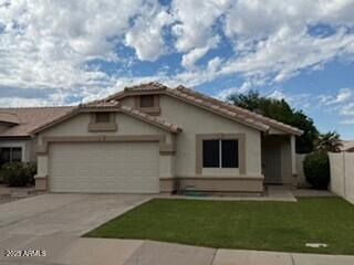 2702 South Ananea Mesa, AZ 85209 - Photo 1 of 15 a front view of a house with a yard