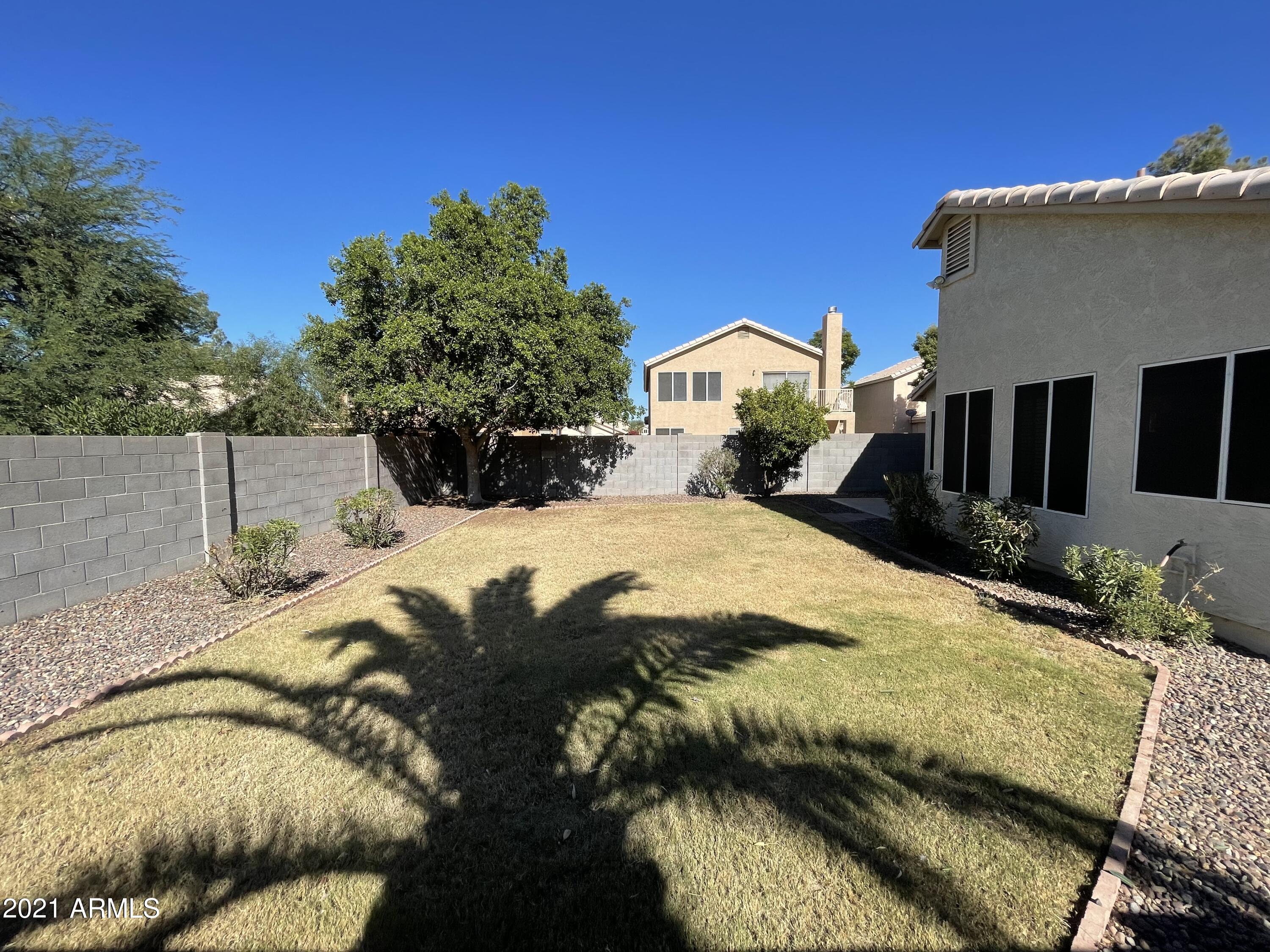 2702 South Ananea Mesa, AZ 85209 - Photo 15 of 15 a view of a house with a bed